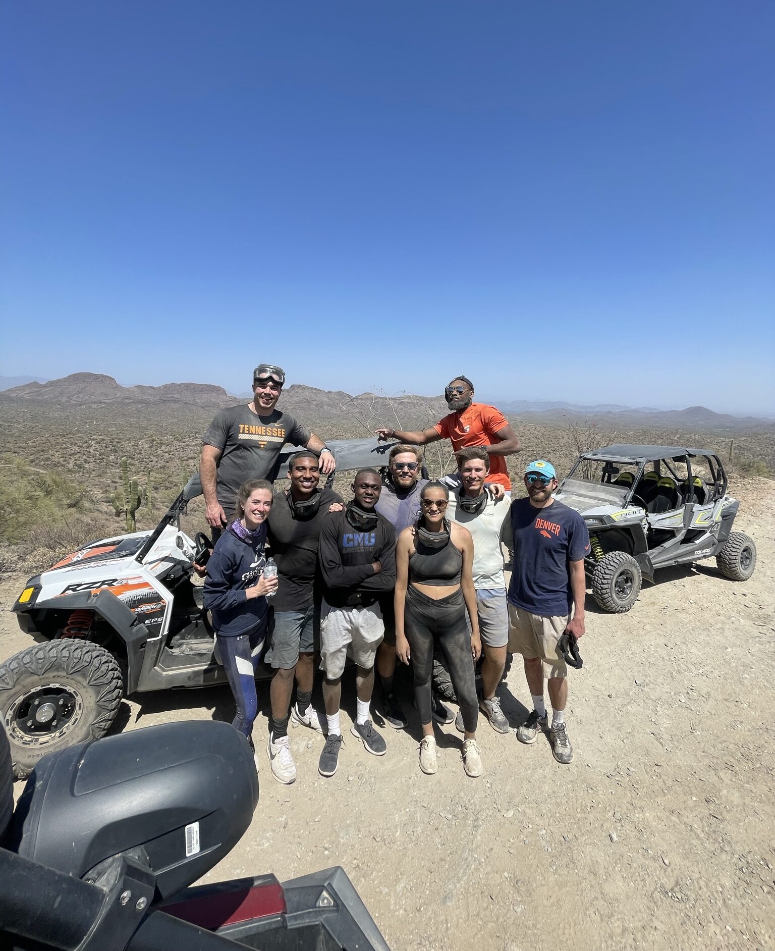Guests wearing closed-toe shoes and desert-ready clothing before an Arizona ATV tour
